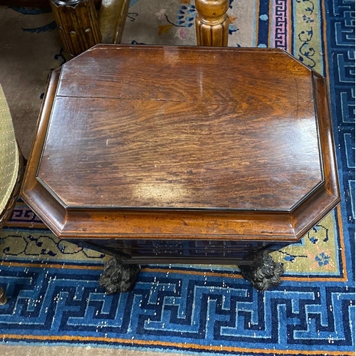 1174 - A Regency and later mahogany sarcophagus wine cooler on cast metal lions paw feet, width 56cm, depth... 