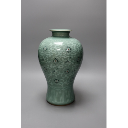 1252 - A Korean celadon ground baluster vase, 32cm