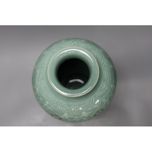 1252 - A Korean celadon ground baluster vase, 32cm