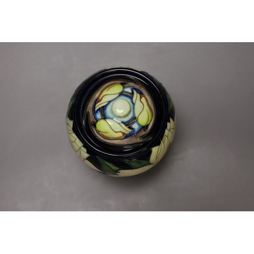 1262 - A Moorcroft jar and cover, 15cm