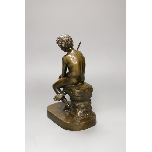 1265 - An early 20th century bronze figure of a fisherboy, 25cm