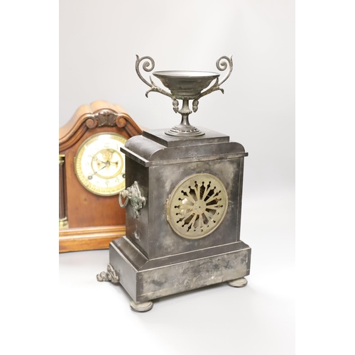 1286 - A 19th century slate urn mantel clock with lion feet, together with an American column mantle clock,... 