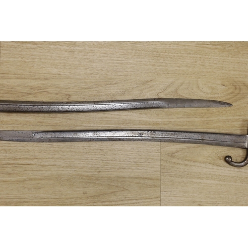 1294 - Two 19th century European bayonets, 69cm tall