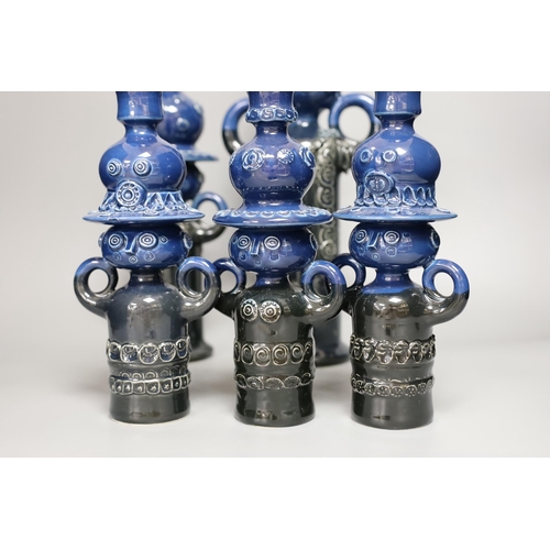 1301 - Bjørn Wiinblad for Rosenthal, five blue glazed figural pots, 47cm