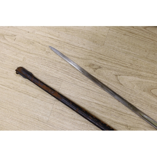 1310 - An officer's sword in fitted leather slip, overall length 100cm