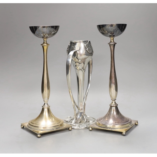 1319 - An Archibald Knox style pewter vase and two Swedish silver plated candlesticks, 26cm