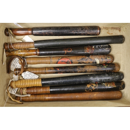 1349 - Eight Victorian truncheons, mostly painted, in suitcase