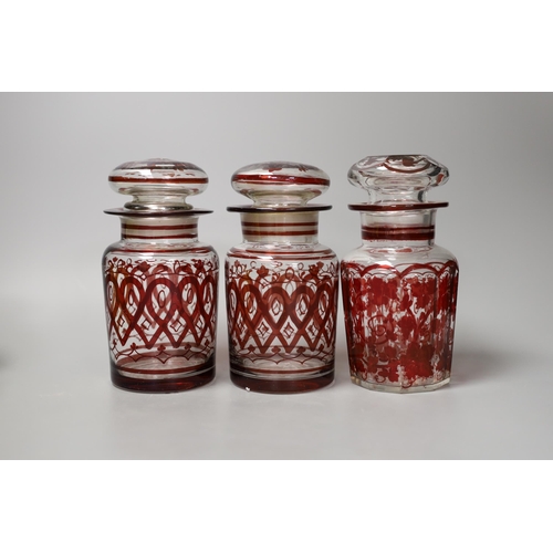 1355 - A pair of ruby overlaid goblets, three ruby and glass pickle jars and other sundry glassware