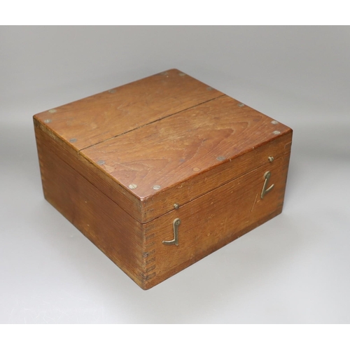 1359 - A wooden cased ship's compass, 14cm tall