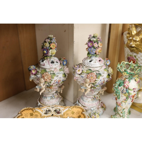 1386 - A mixed collection of floral encrusted 19th century and later Continental porcelain