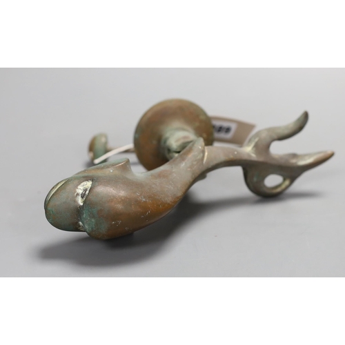 1389 - A Victorian cast bronze Dolphin door knocker,21cms long.