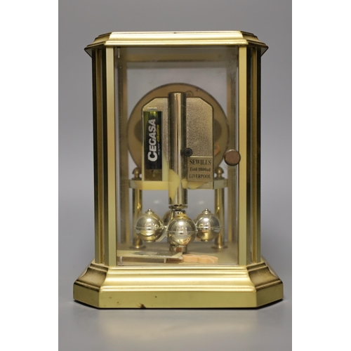 1393 - A four glass Sewells 400 day clock, 20cm high.