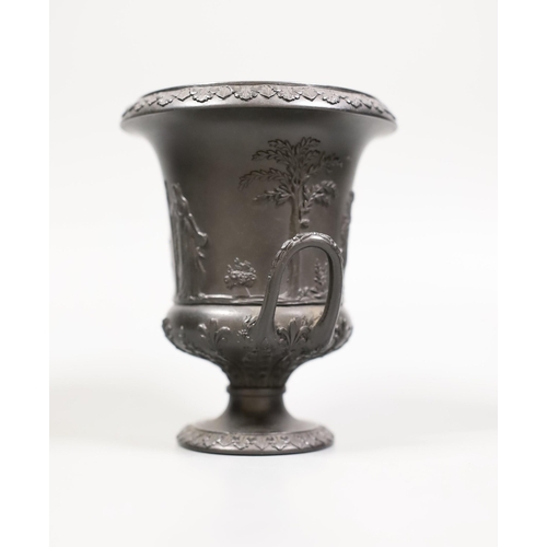 1411 - A Wedgwood black basalt urn vase, 13cm tall