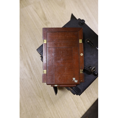 1429 - An early 20th century Royal Engineer's cased plate camera and plates