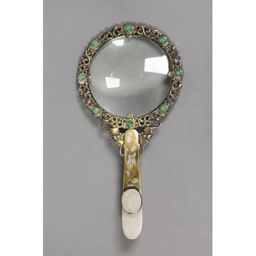 1434 - An Eastern white metal SILVER marked magnifying glass with carved jade belt hook handle, total len... 