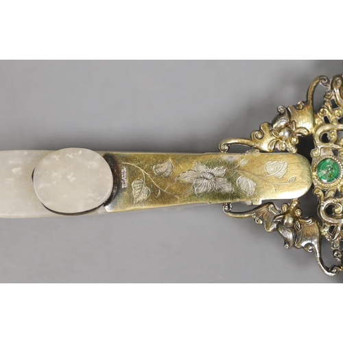 1434 - An Eastern white metal SILVER marked magnifying glass with carved jade belt hook handle, total len... 