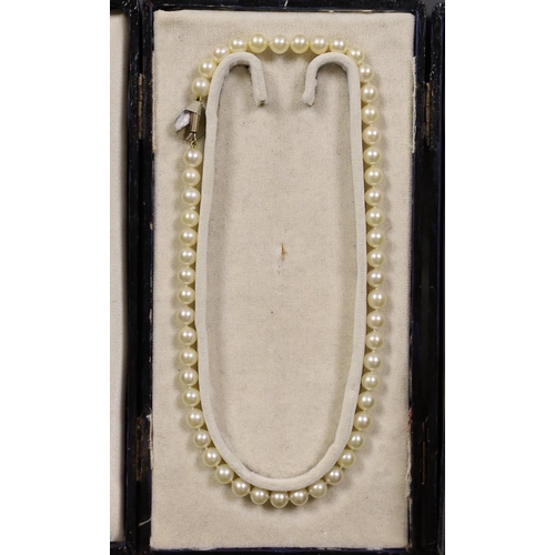 1914 - Four assorted cased single strand cultured pearl necklaces, with yellow metal or sterling clasps, lo... 