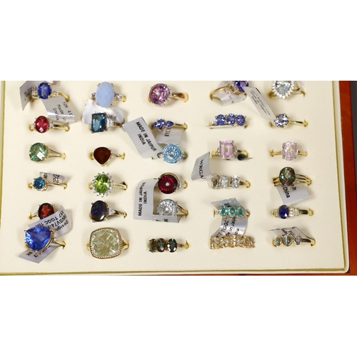 1916 - Fifty assorted modern gem set dress rings, to include forty seven 9ct gold rings including morganite... 