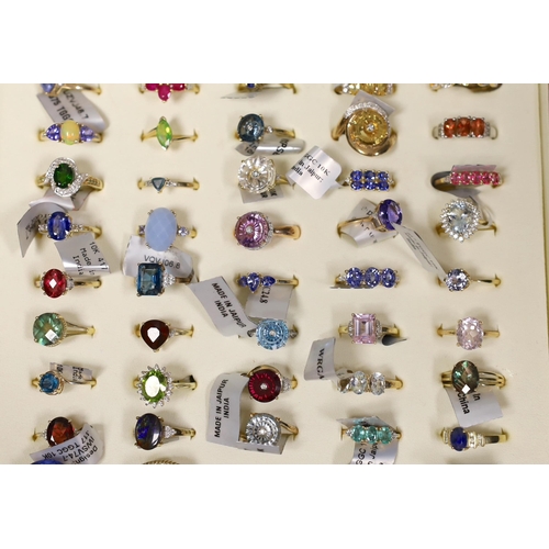 1916 - Fifty assorted modern gem set dress rings, to include forty seven 9ct gold rings including morganite... 