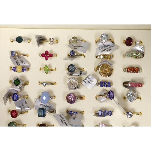 1916 - Fifty assorted modern gem set dress rings, to include forty seven 9ct gold rings including morganite... 