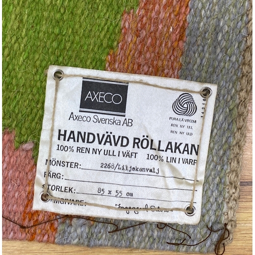 1494 - Two Axeco handvard tapestry rugs; Skrattner & Liljekonvalj, 55x88cm