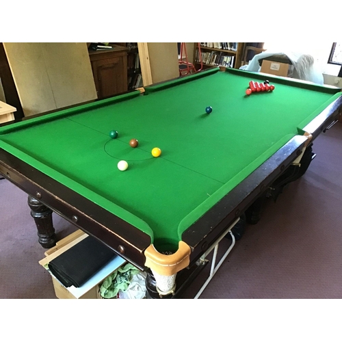 1001 - An early 20th century mahogany three quarter size snooker table on six turned tapered legs, unbrande... 