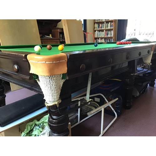 1001 - An early 20th century mahogany three quarter size snooker table on six turned tapered legs, unbrande... 