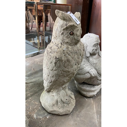 1003 - A reconstituted stone garden ornament modelled as a standing owl, height 71cm