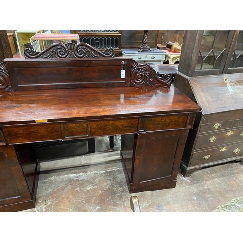 1009 - An early Victorian mahogany pedestal sideboard, length 190cm, depth 56cm, height 132cm