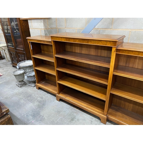 1012 - A mahogany open dwarf breakfront bookcase, width 213cm, depth 33cm, height 115cm