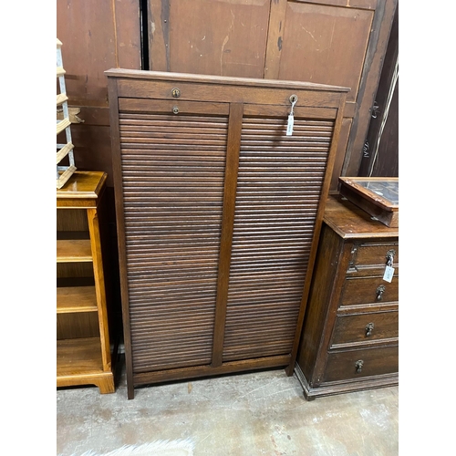 1014 - A mid century double fronted tambour shutter filing cabinet, width 89cm, depth 36cm, height 150cm... 