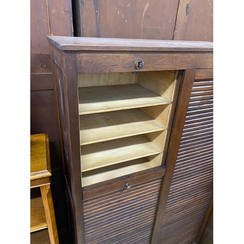 1014 - A mid century double fronted tambour shutter filing cabinet, width 89cm, depth 36cm, height 150cm... 