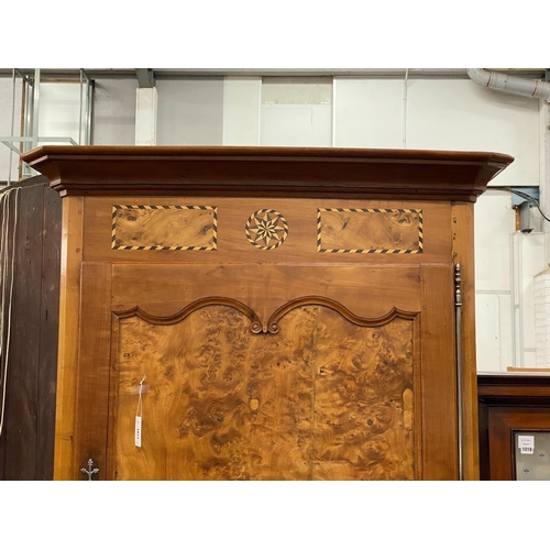 1017 - An 18th century Continental walnut armoire, width 118cm, depth 69cm, height 227cm