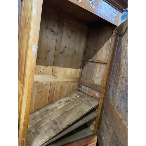 1017 - An 18th century Continental walnut armoire, width 118cm, depth 69cm, height 227cm