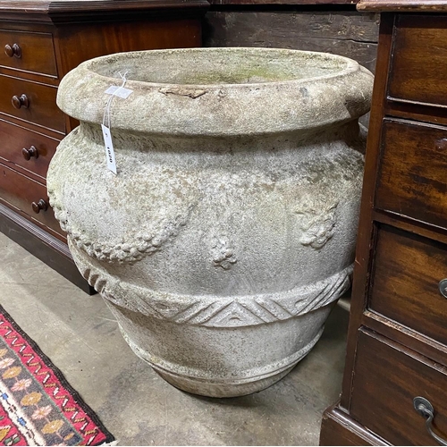 1020 - A large circular reconstituted stone garden planter, diameter 66cm, height 66cm