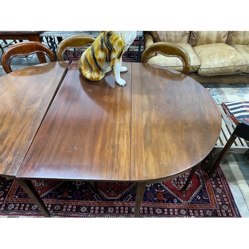 1035 - A George III mahogany D end extending dining table with later drop leaf, 180cm extended, depth 127cm... 