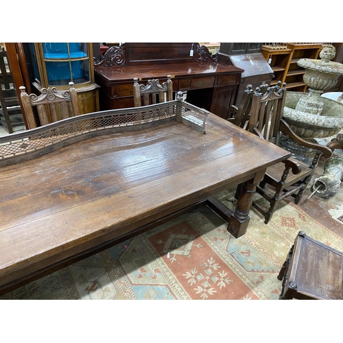 1050 - An 18th century style rectangular oak refectory dining table, length 259cm, width 101cm, height 76cm... 