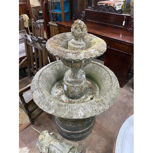 1053 - A large circular reconstituted stone garden fountain, diameter approx. 90cm. height 140cm. Provenanc... 