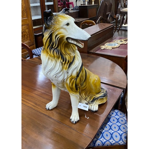 1059 - A mid 20th century ceramic figure of a seated collie, height 68cm