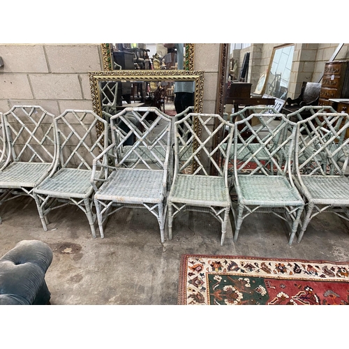 1067 - A set of ten white painted caned bamboo conservatory chairs with cockpen backs, two with arms