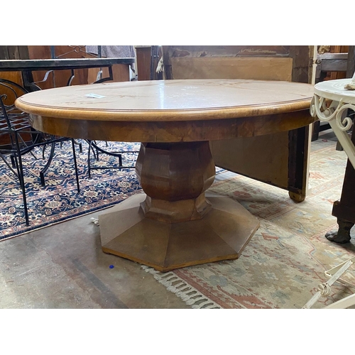 1090 - An Art Deco style circular figured walnut low centre table, diameter 120cm, height 62cm