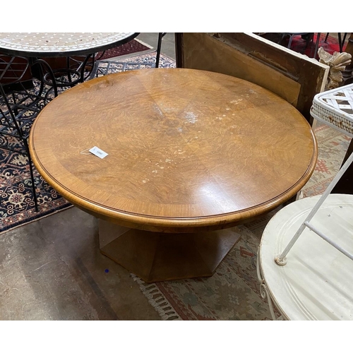 1090 - An Art Deco style circular figured walnut low centre table, diameter 120cm, height 62cm