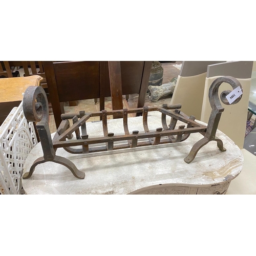 1094 - A wrought iron fire basket, width 97cm, depth 31cm, height 41cm and  fire-dogs