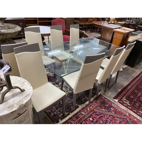 1097 - A contemporary rectangular glass topped dining table, length 199cm, depth 107cm, height 78cm and a s... 