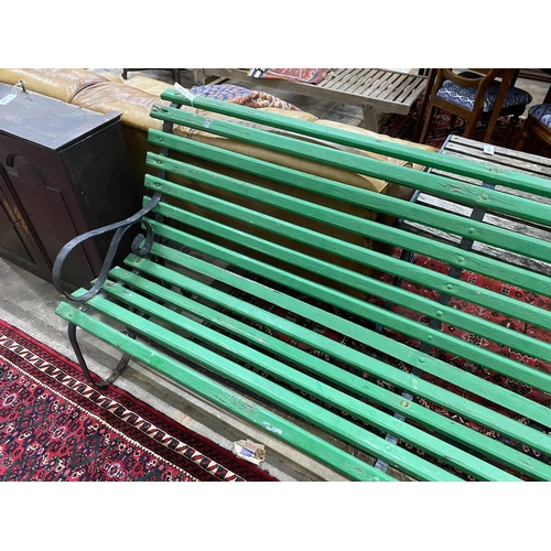 1100 - A wrought iron painted slatted wood garden bench, length 213cm, width 70cm, height 86cm