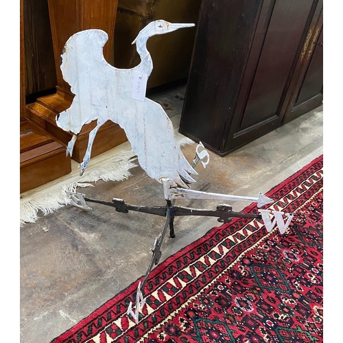 1102 - A painted iron heron weather vane, height 64cm