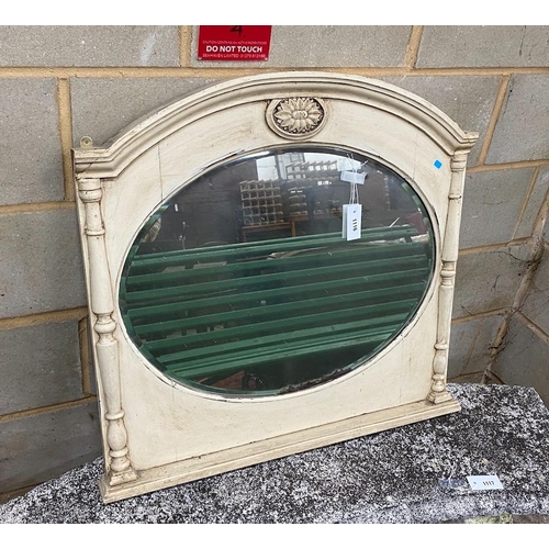 1116 - A cream painted overmantel mirror with oval plate, width 81cm, height 77cm