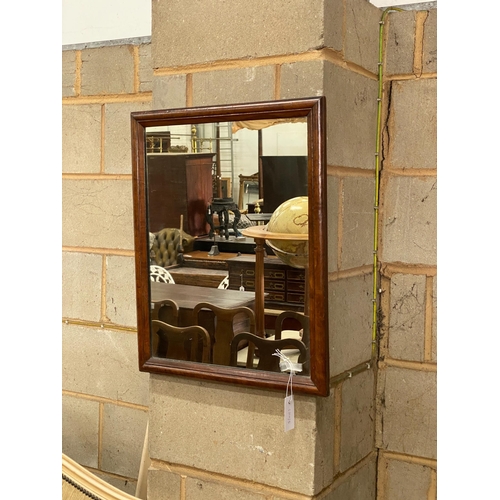 1130 - A rectangular walnut framed wall mirror, width 47cm, height 60cm