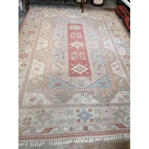 1133 - A Caucasian style polychrome geometric carpet, 360 x 260cm