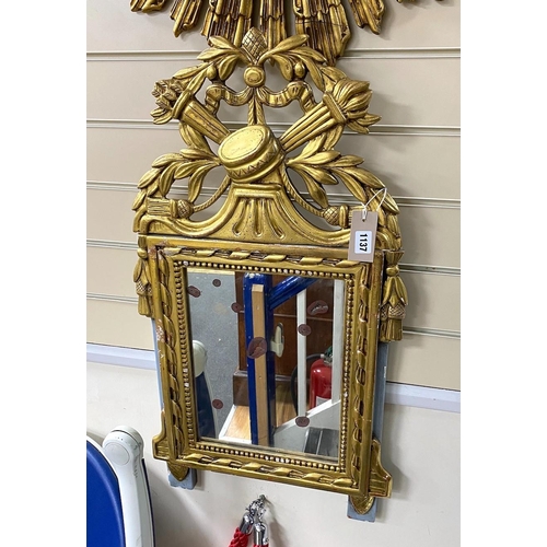 1137 - A Continental carved giltwood wall mirror, width 44cm, height 80cm